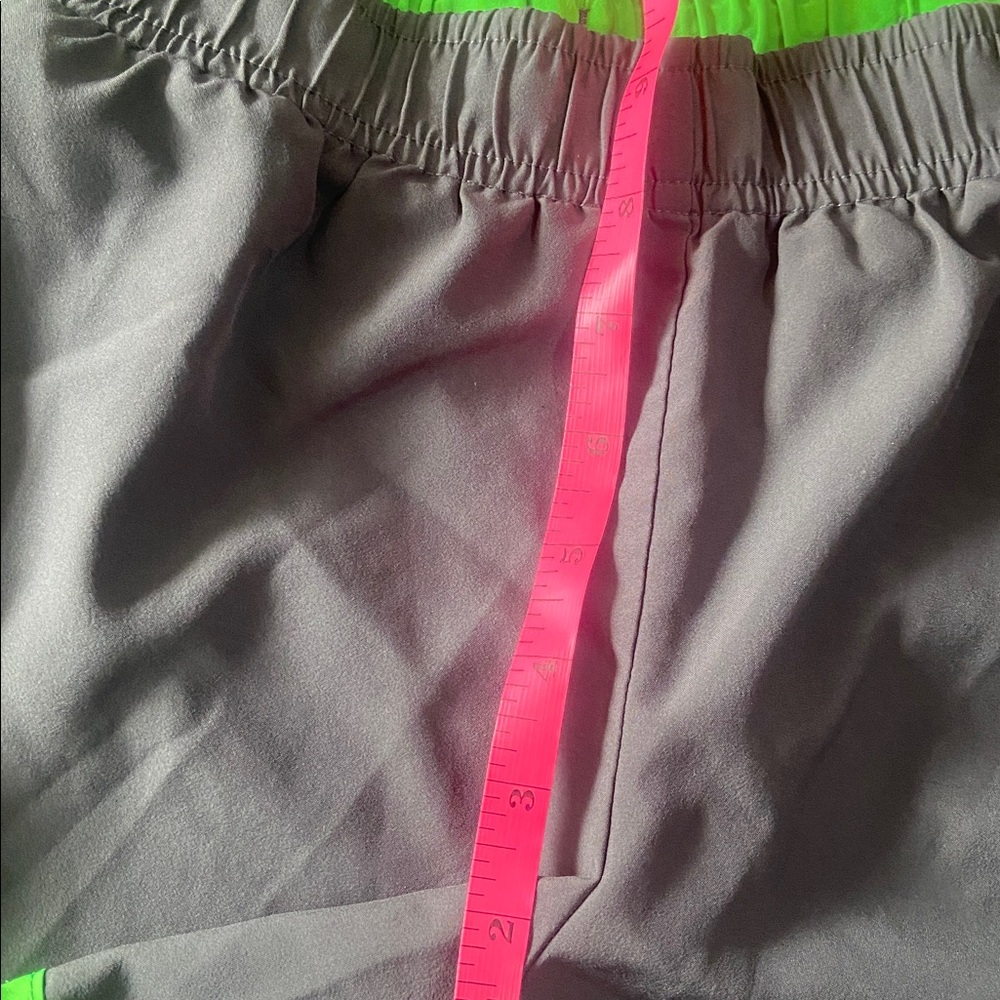 $2 - Xersion Charcoal Shorts with Neon Green Trim - Picture 5 of 7